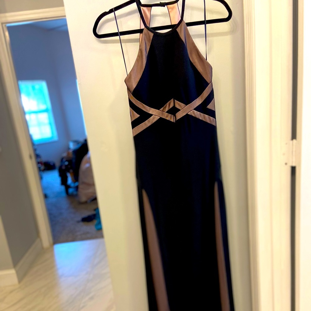Long formal evening gown. Black and light pinks tones. Classy and elegant.